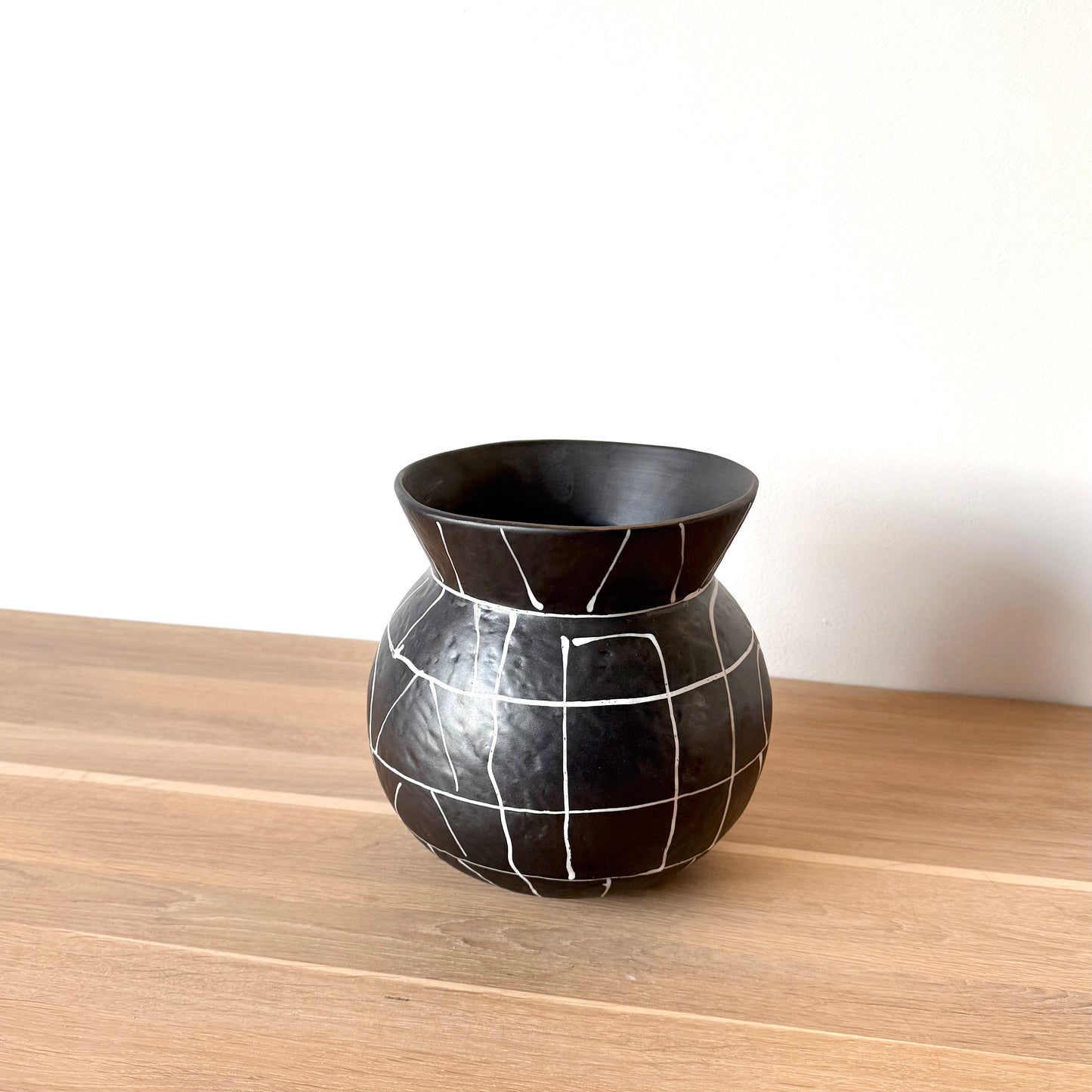 Vase/cache-pot noir et blanc